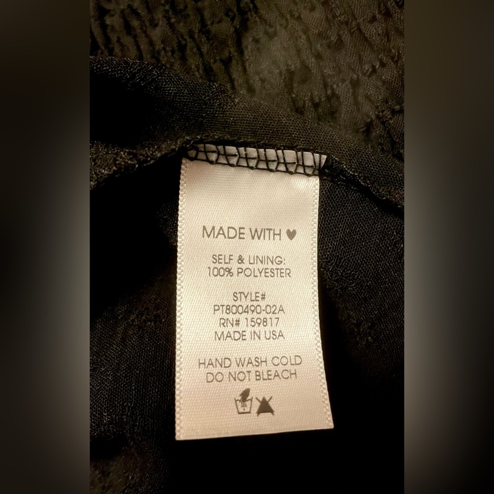 Arula Textured Black Babydoll Top
SIZE 1X = 14/16 **NEW WITH TAGS!** - Picture 8 of 12